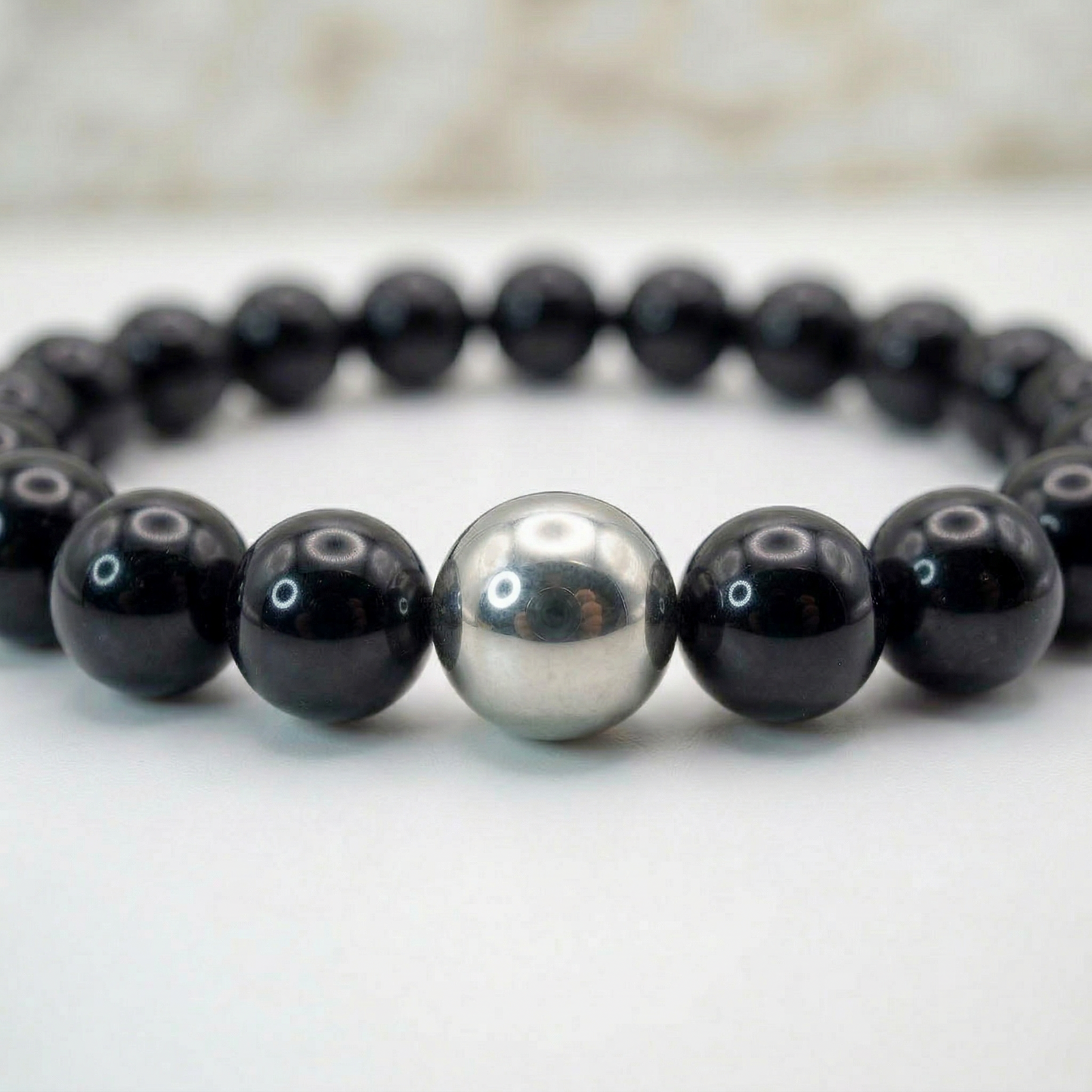 Tiefe & Schutz – Armband aus schwarzem Obsidian mit Edelstahl-Akzent