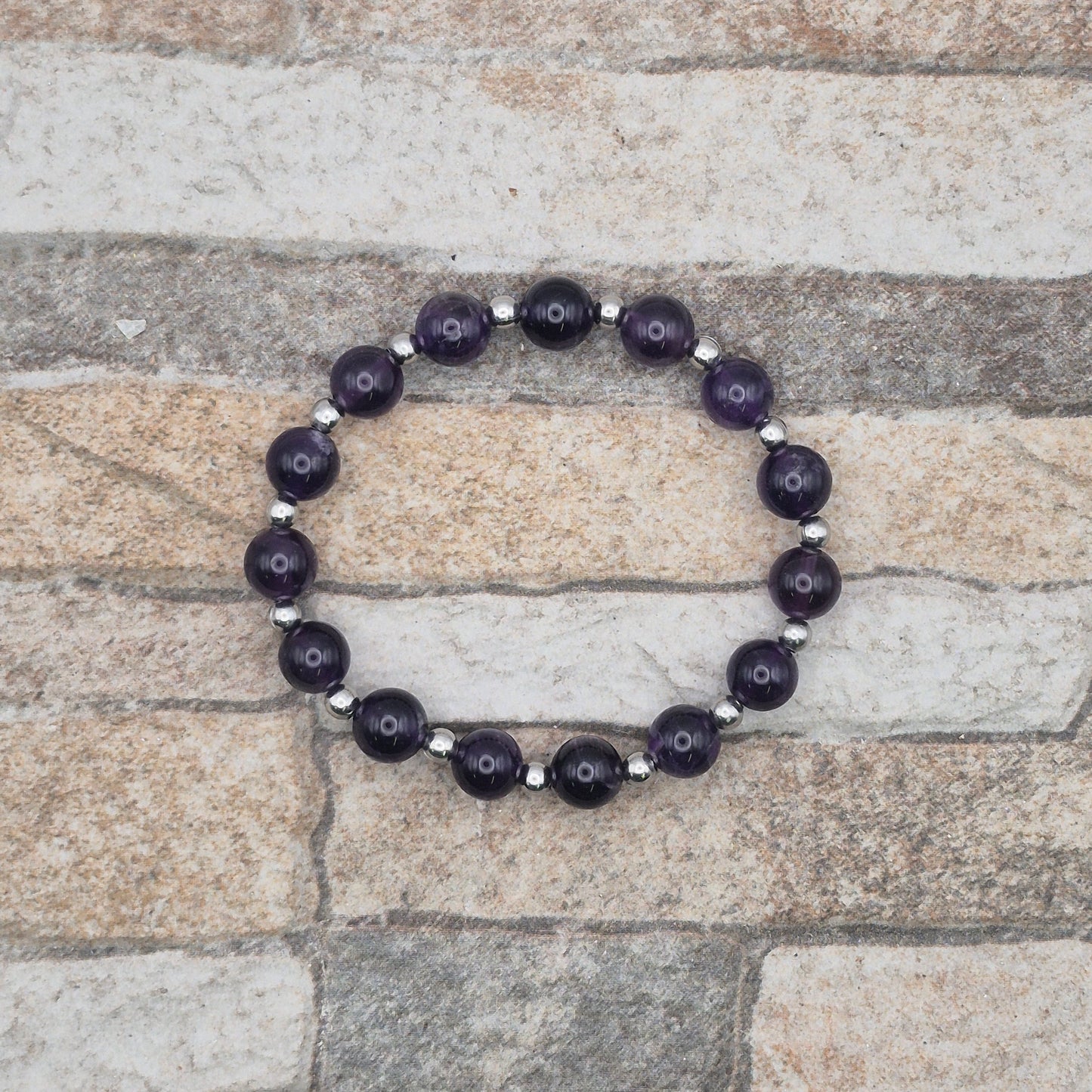 Perlenarmband Tenebris - Amethyst und Edelstahlperlen