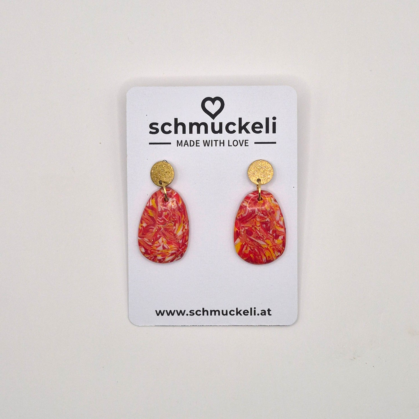 Sonnenfunkeln – Rote Statement-Ohrringe mit Goldakzenten