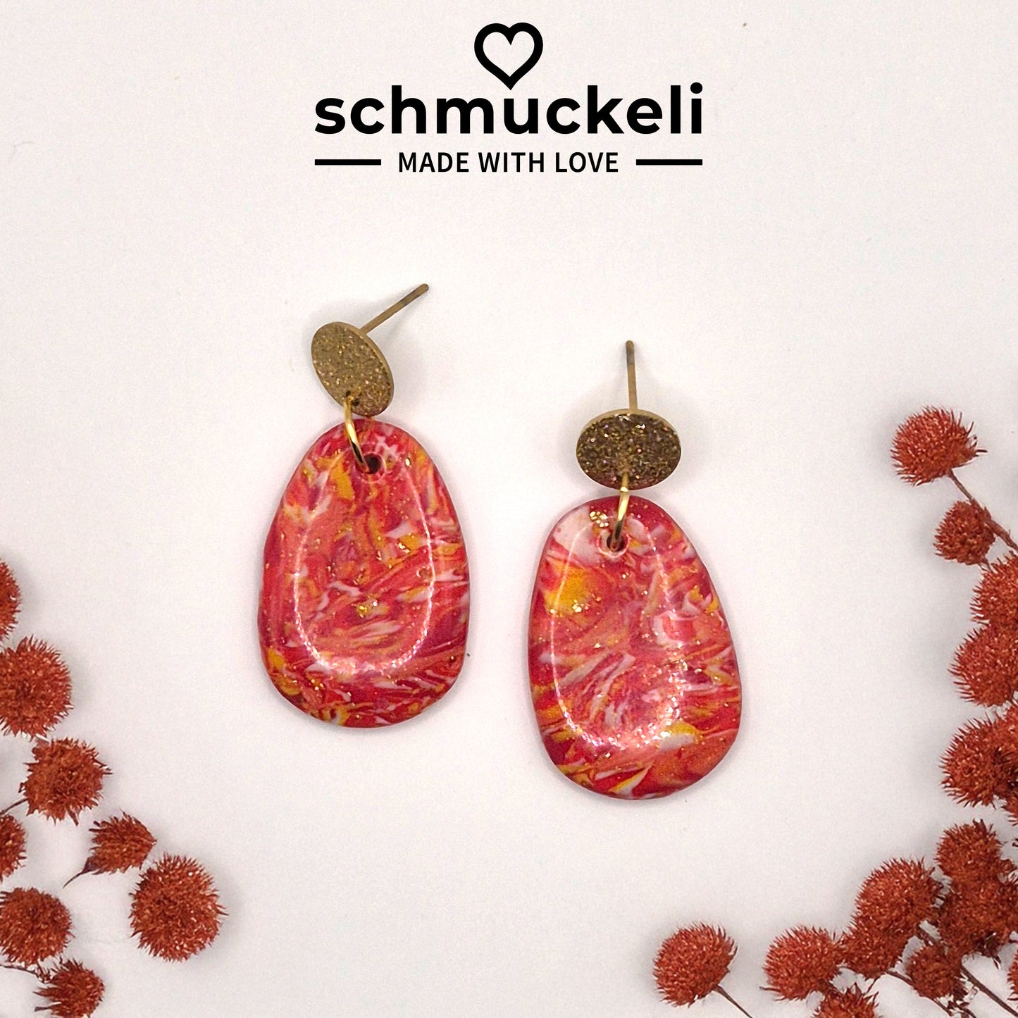 Sonnenfunkeln – Rote Statement-Ohrringe mit Goldakzenten