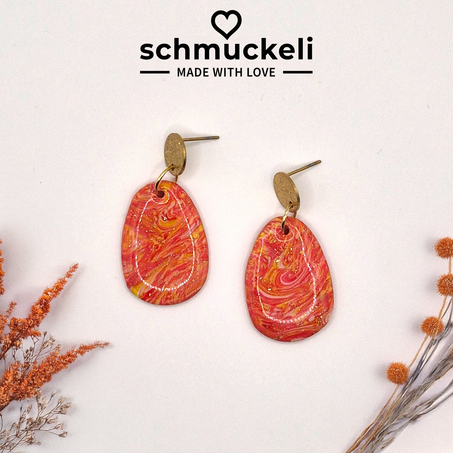 Sonnenwirbel – Leuchtende Marmor-Ohrringe in Rot-Orange-Gold