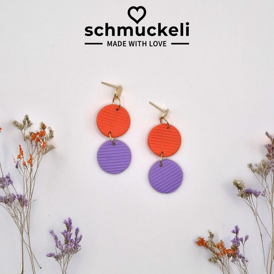 Kreiszauber - zweifarbige Ohrringe aus Polymer Ton in Orange und Lila