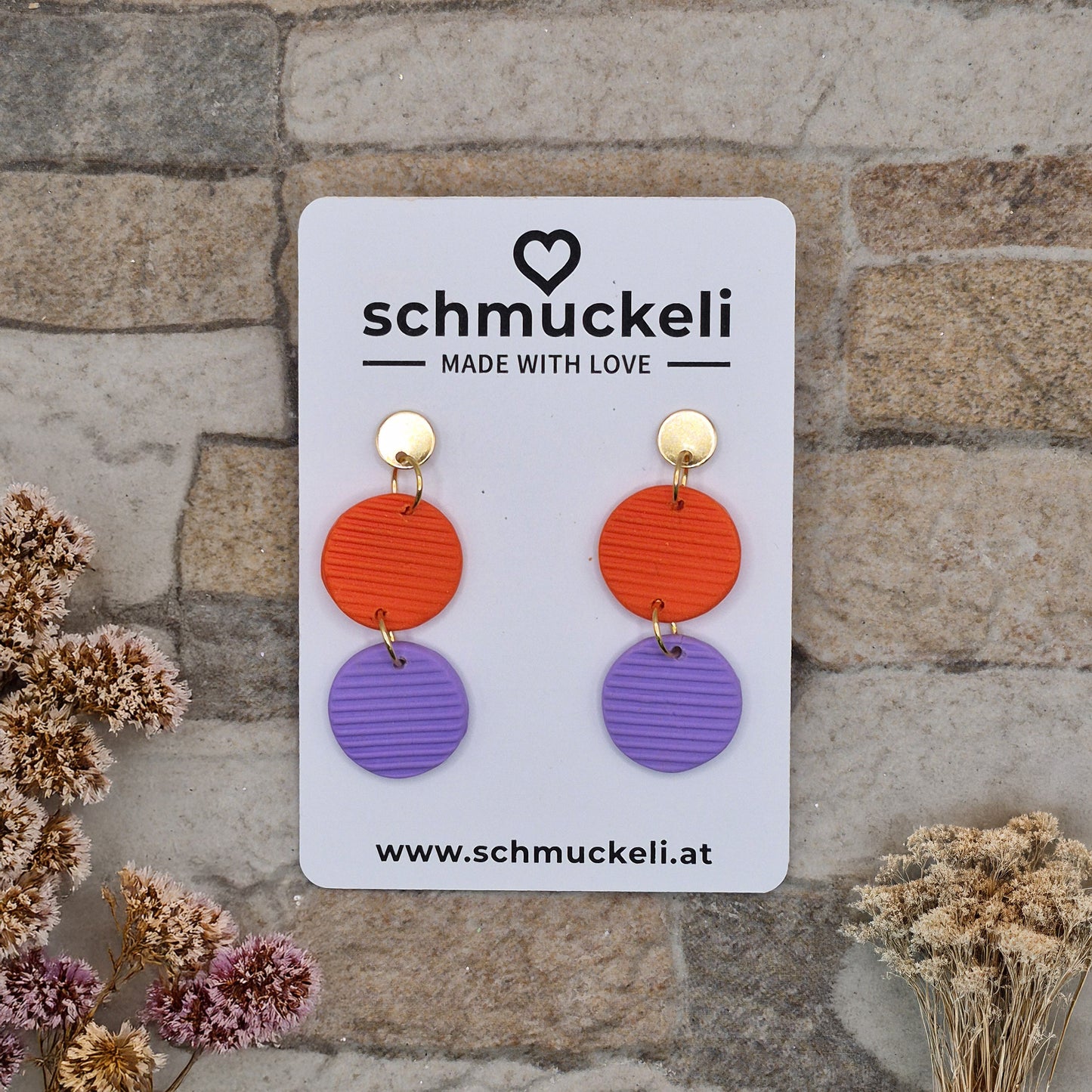 Kreiszauber - zweifarbige Ohrringe aus Polymer Ton in Orange und Lila